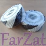 Ace cu gamalie din perle albe si negre