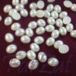 Margele jumatati ovale de cusut 10 x 14 mm cod 09