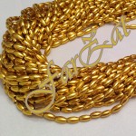 Margele aurii la sirag de 8x4 mm cod 214