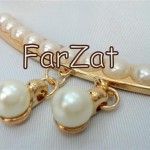 Aplicatie aurie cu perle