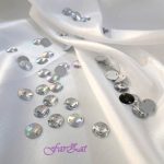 Pietre de cusut rotunde cu aspect Swarovski de 12 mm cod 108